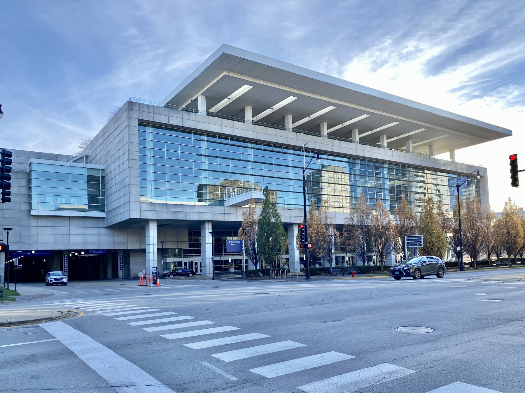 Double-height glazed entrance to a large public building